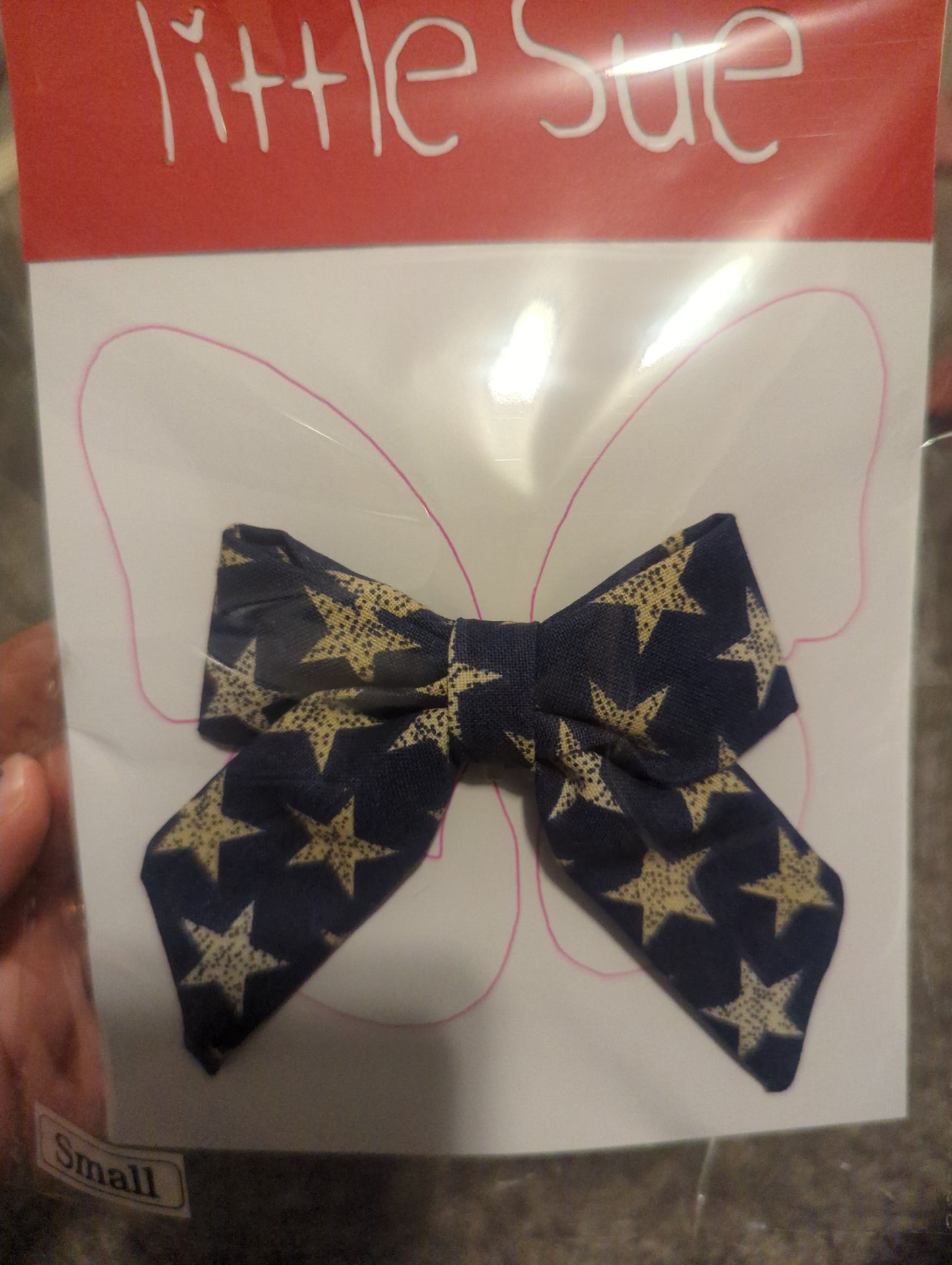 Blue with white stars bow -small